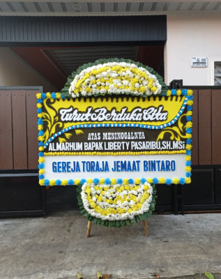 Papan Bunga Duka di Ulugawo